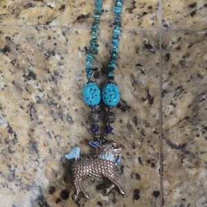 Turquoise and Silver Necklace with Animal Pendant